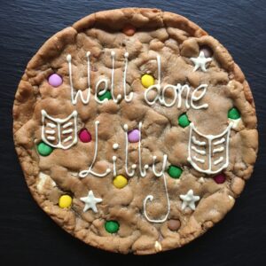 Well done giant cookie, personalised achievement gift, double chocolate with Smarties. decorated with white chocolate. gluten free